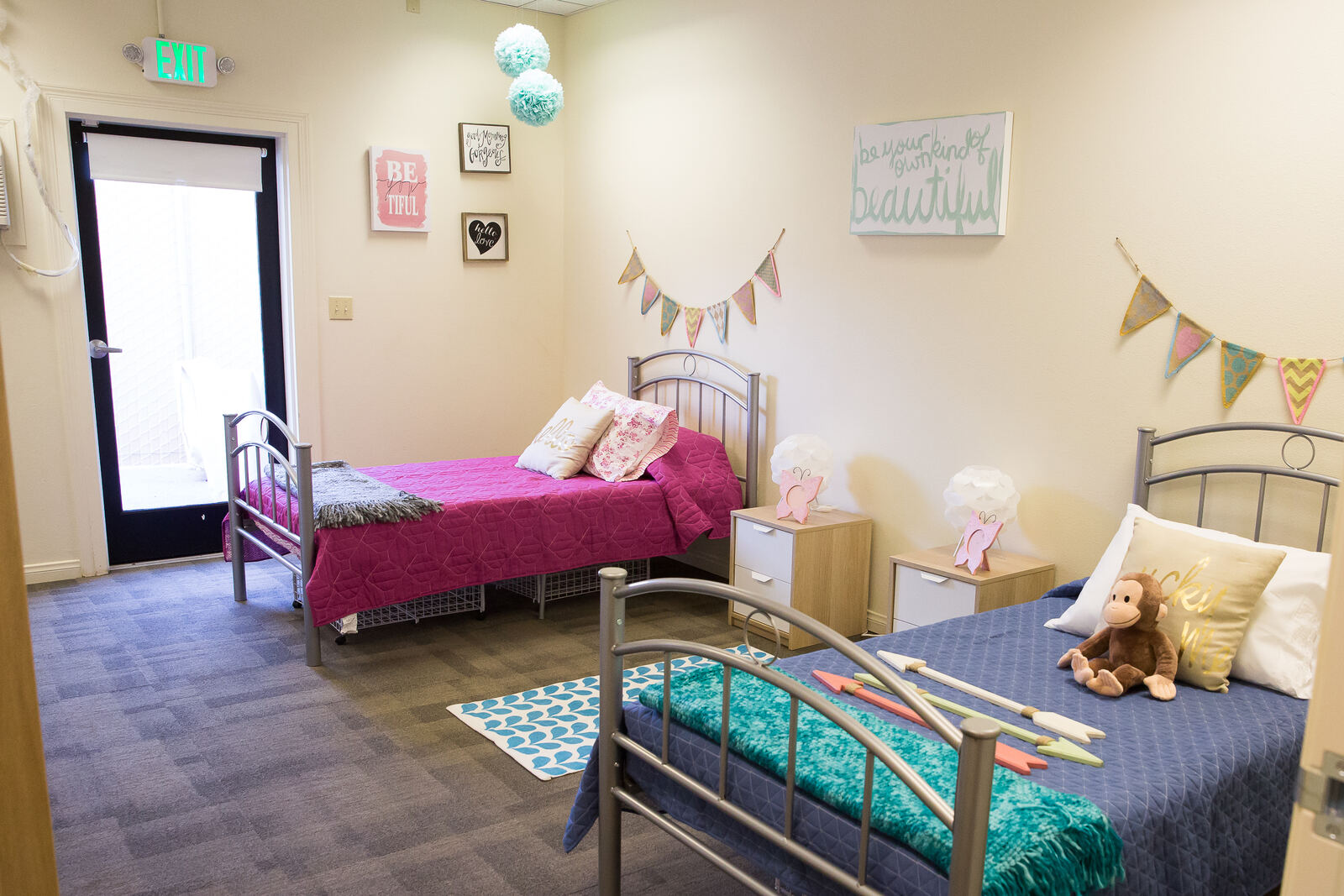 A bedroom made up and waiting for two girls in our Bakersfield safe home